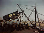 Grumman F6F-3 being hoisted on carrier at San Diego, 1943 