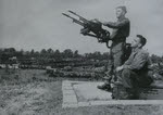 Gunners guarding a vehicle depot before D-Day 