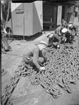 Crew on HMS Hero cleaing chains, 1942