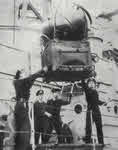 Loading a mine onto HMS Manxman 
