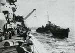 HMS Raider alongside HMS Warspite 