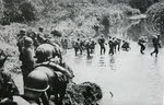 Merrill's Marauders crossing a stream, Burma, 1944 