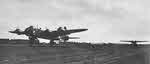 Stirling IV taking off towing a Horsa glider 