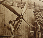 Women testing balance of airship propeller 