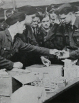 Glider Tug pilots taking emergency rations before Operation Varsity 