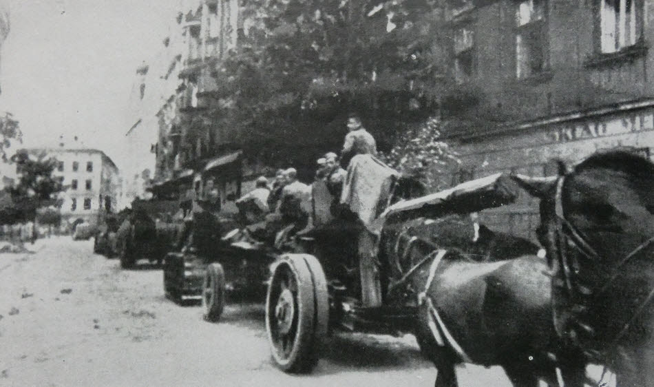 122mm Gun M1931 being towed through Lvov 