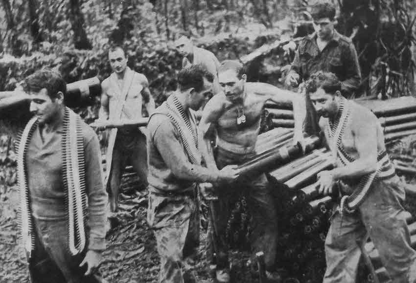 US troops moving 75mm shells, Mt Tambu, 1943 