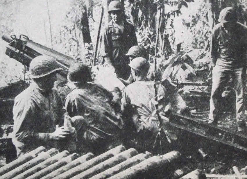 75mm Pack Howitzer firing at Mt Tambu 