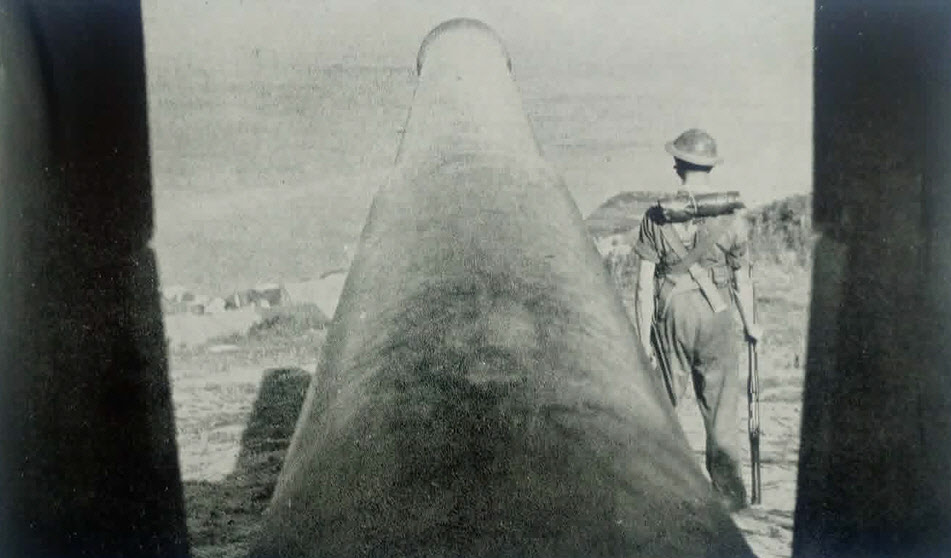 Sentry next to BL 9.2in coastal defence gun, UK 