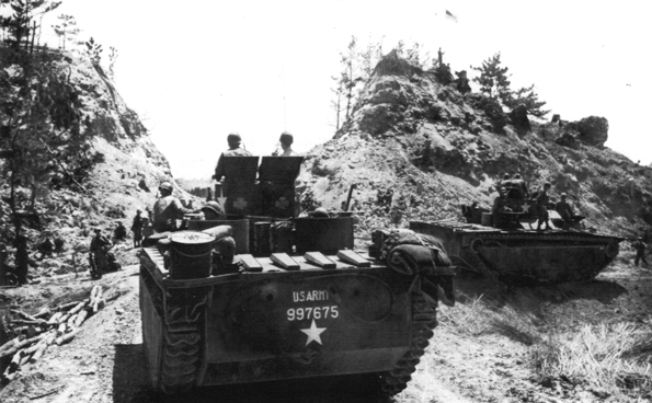 Tanks leaving the beach on Okinawa