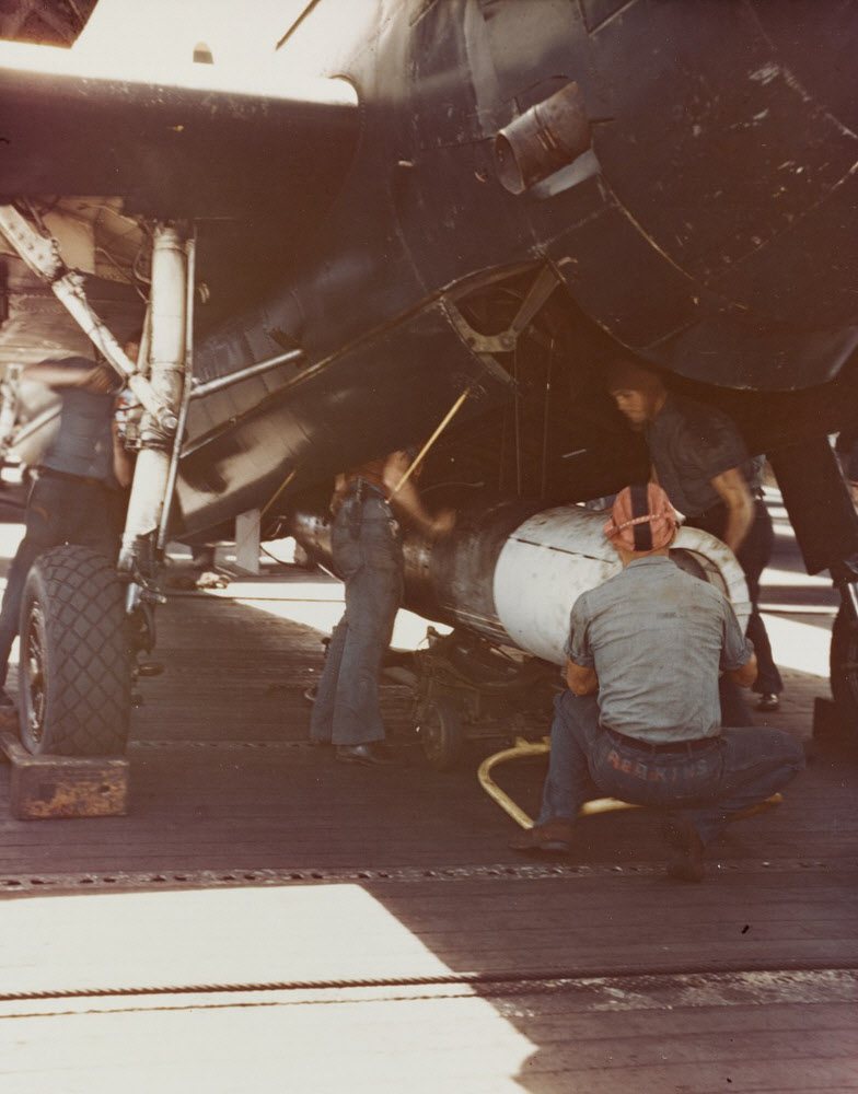 Loading Torpedo onto Avenger, USS Bennington (CV-20), 1945 