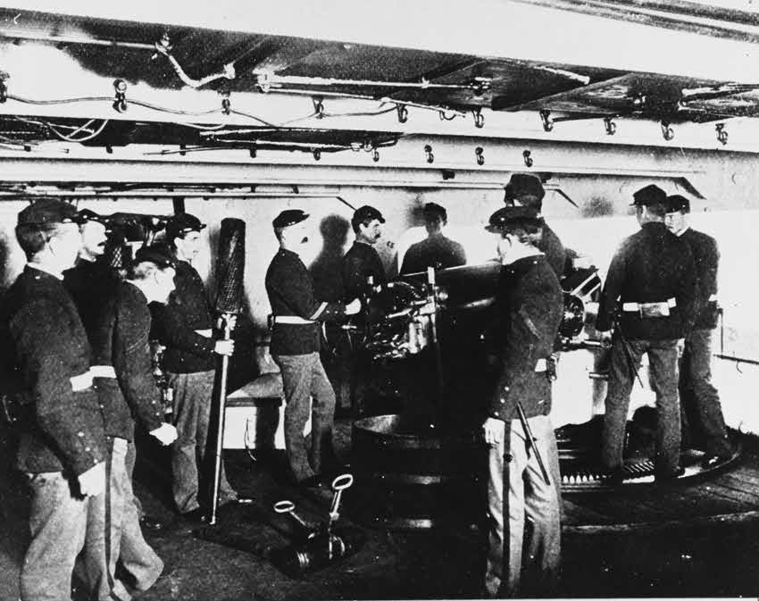 US Marines at 5in/ 40 broadside guns of USS Brooklyn (CL-40) 