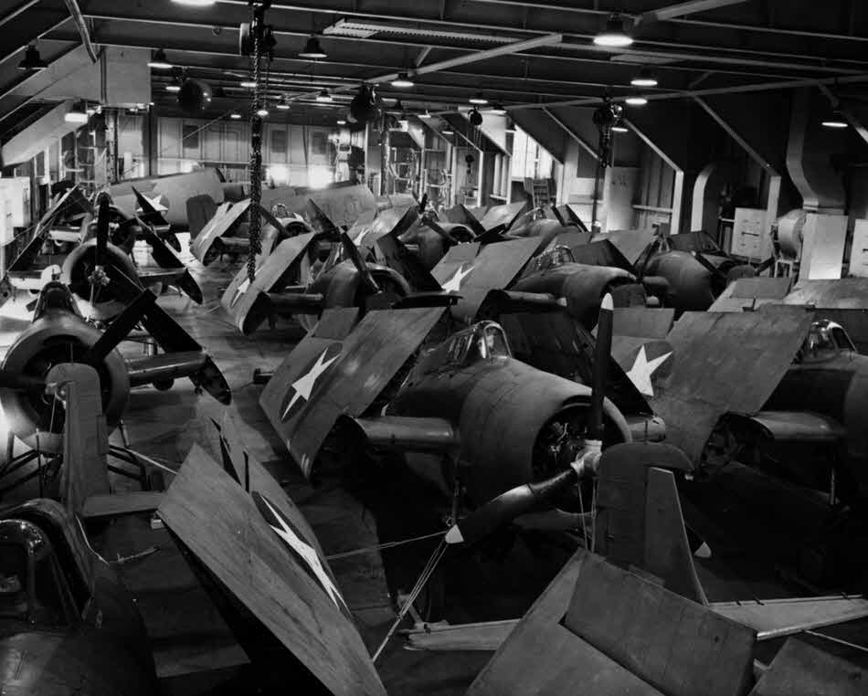Grumman F4F-4s Wildcats in the hanger of USS Charger (CVE-30) 