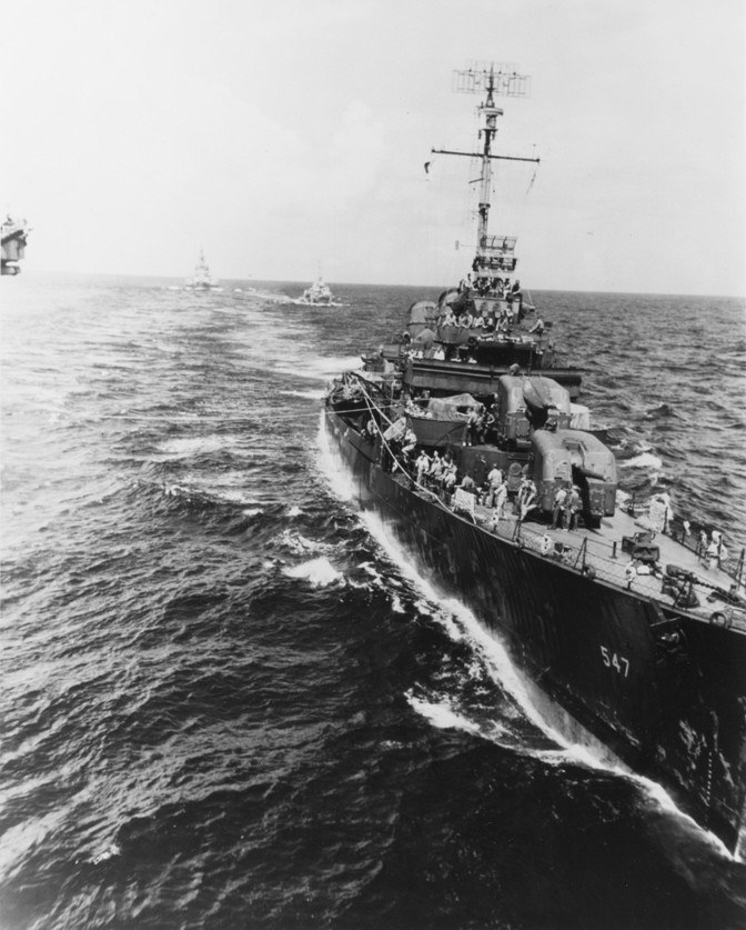 USS Cowell (DD-547) returning pilot to carrier during battle of Leyte Gulf 