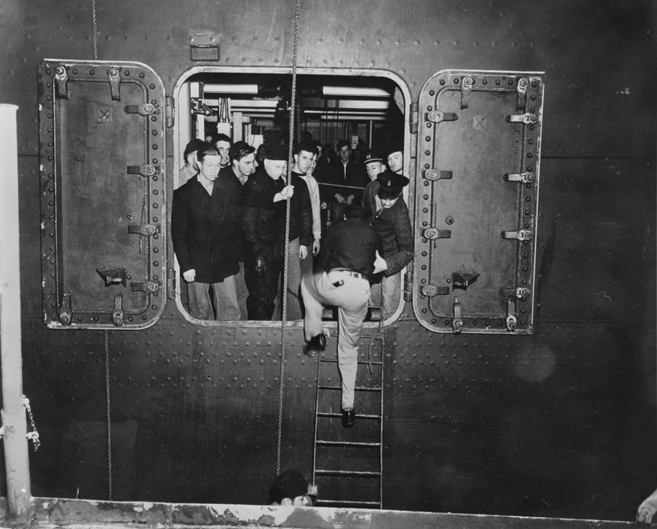 Crew using watertight doors, USS Kearny (DD-432) 