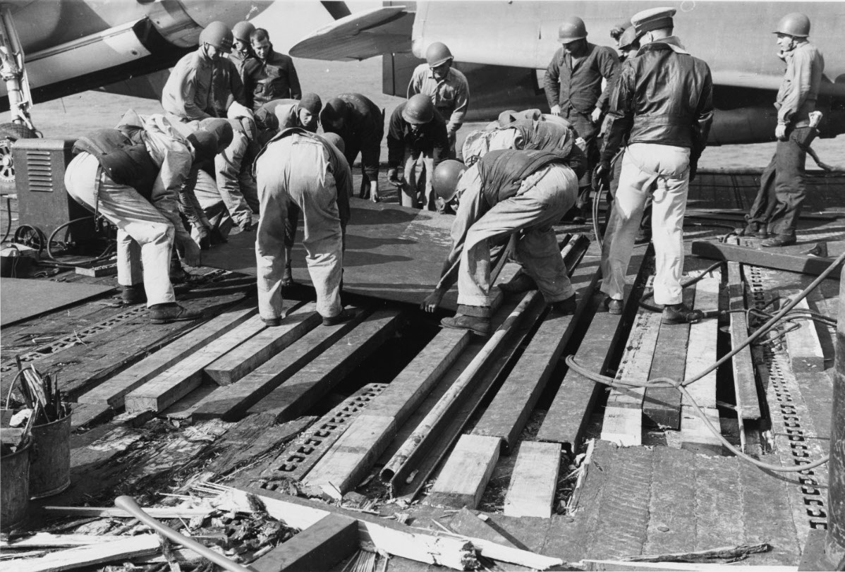Repairing flight deck, USS Langley (CVL-27) 