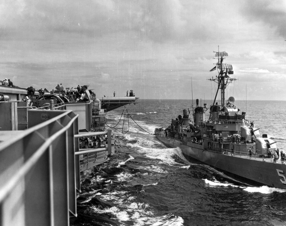 USS Prichett (DD-561) refueling from Midway class carrier, 1950s 