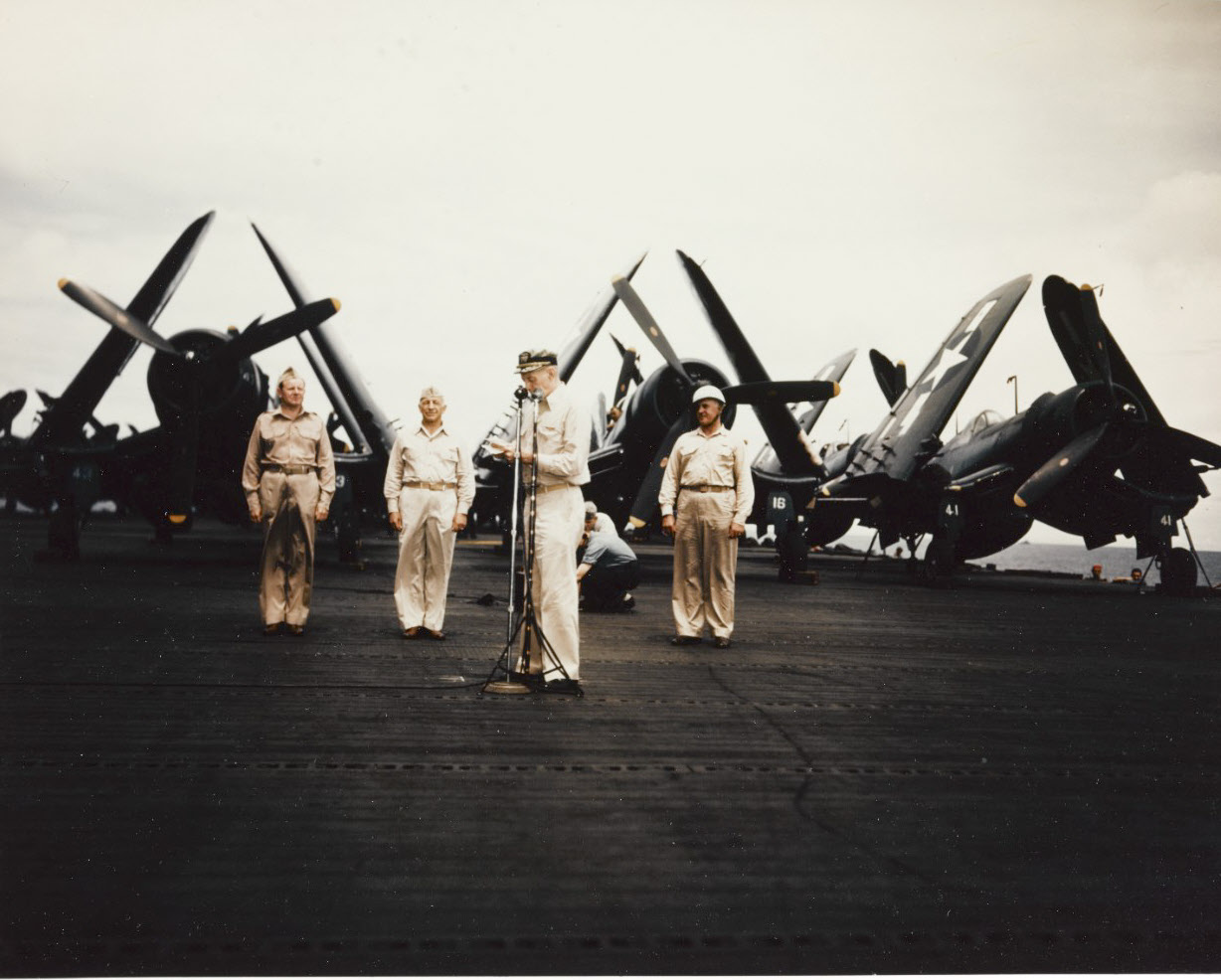 Swearing in Assistant Secretary of the Navy John L. Sullivan, USS Shangri La (CV-38) 