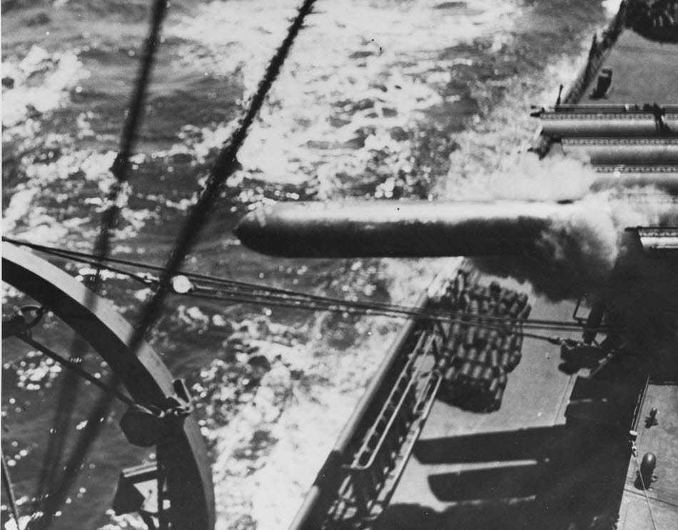 USS Stevens (DD-479) firing 21in torpedo, 1943 