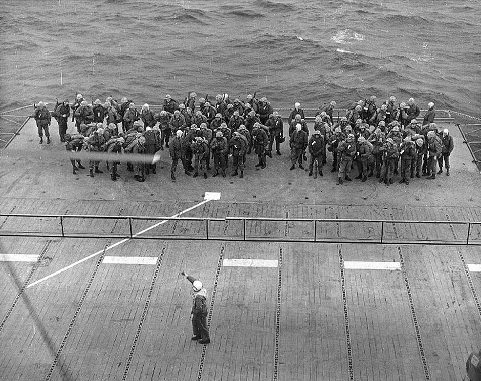 Sixth Marines on deck-edge elevator, USS Tarawa (CA-40)