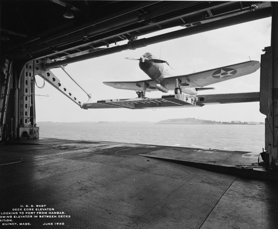 SB2U on Deck Edge Elevator, USS Wasp (CV-7) 