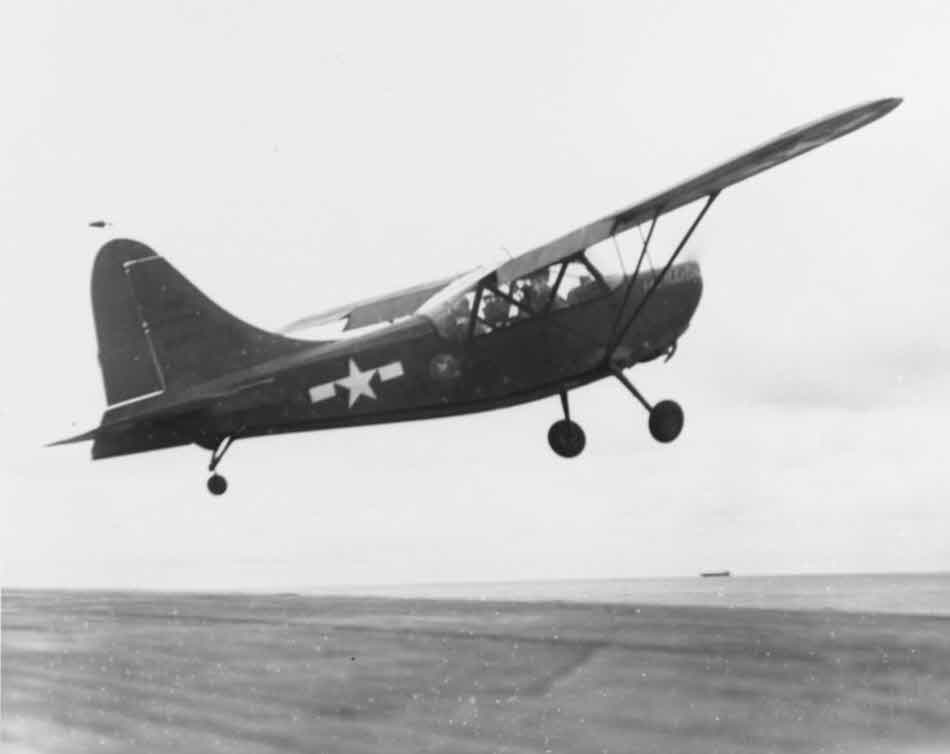 Stinson OY-1 takes off from USS White Plains (CVE-66) 