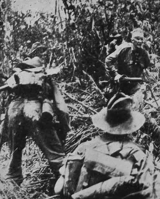 Australians attacking Sattelberg, New Guinea 