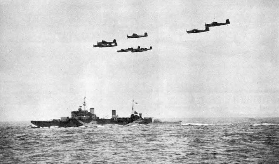 Fairey Barracudas over a Fiji Class Cruiser 