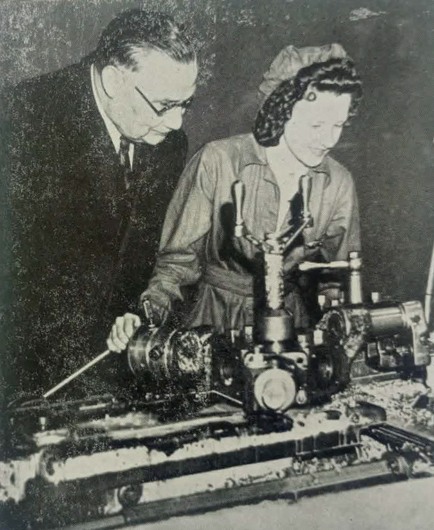 Ernest Bevin watches new war worker 