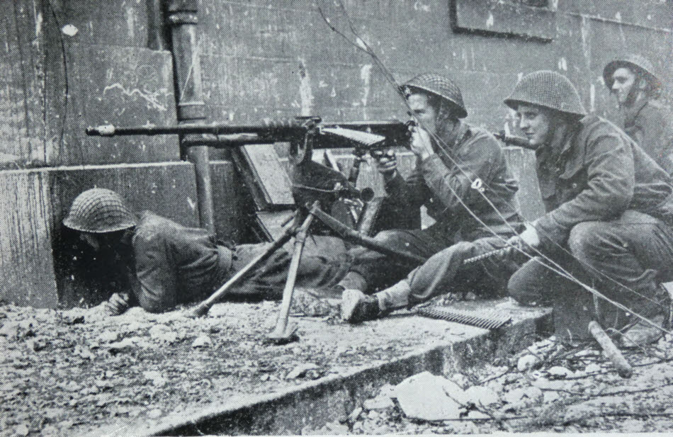 British troops with captured Hotchkiss MG, Caen 