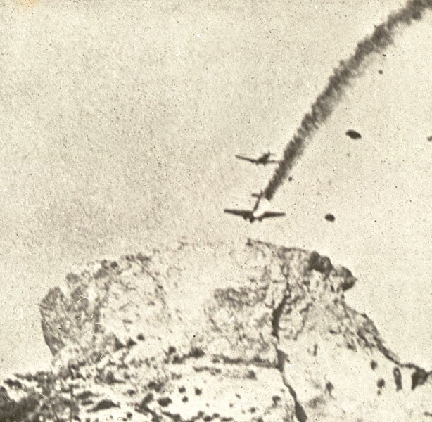 A Ju-52 in flames during the invasion of Crete