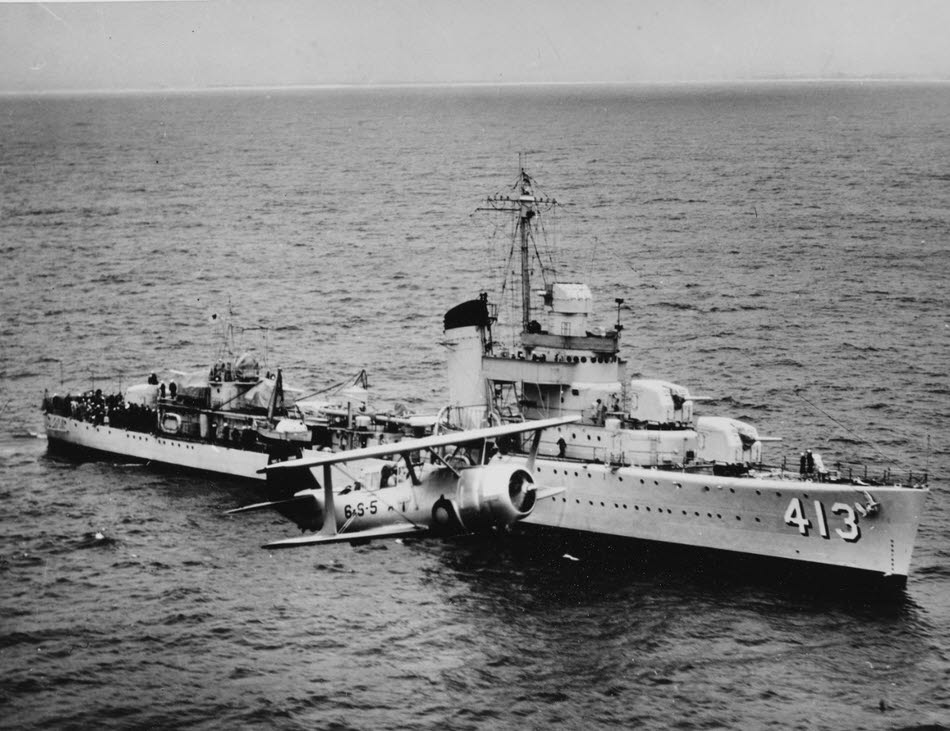 Curtiss SBC-3 passes USS Mustin (DD-413) 
