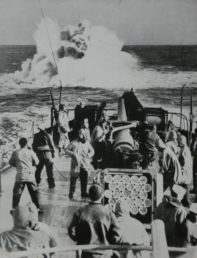Depth Charge explodes behind Coast Guard Cutter 