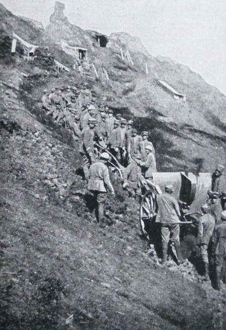 Italian troops dragging a heavy gun 