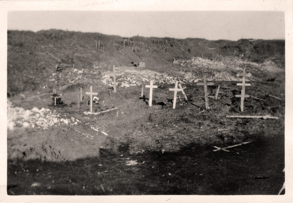 German burials around shell hole, Thiepval