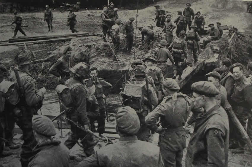 Gordon Highlanders crossing a improvised bridge near Celle 