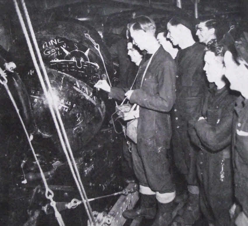 Writing messages on mines on HMS Apollo 