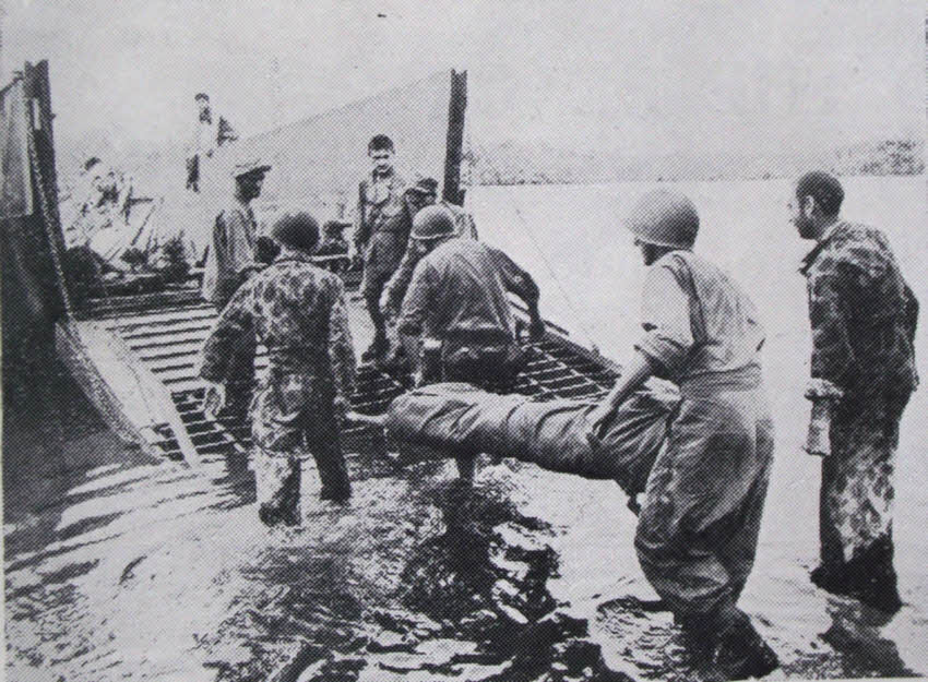 American Soldier being evacuated from New Georgia 