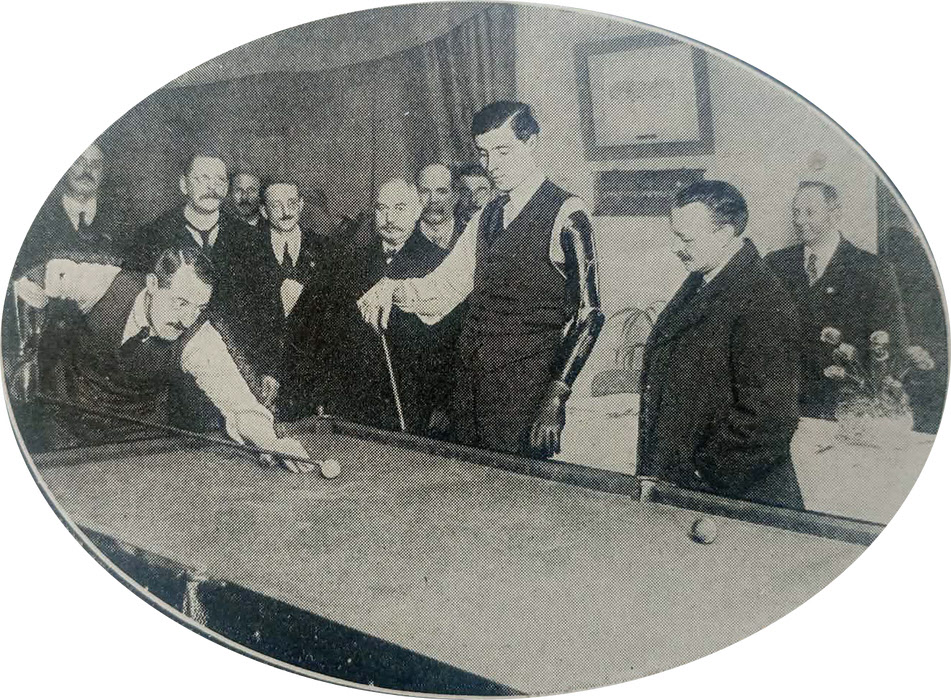 One-armed veterans playing billiards 
