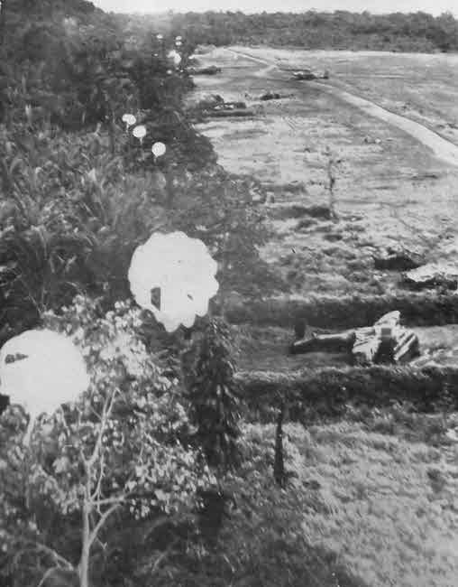 Parachute Bombs falling on airfield at Wewak, 1943 