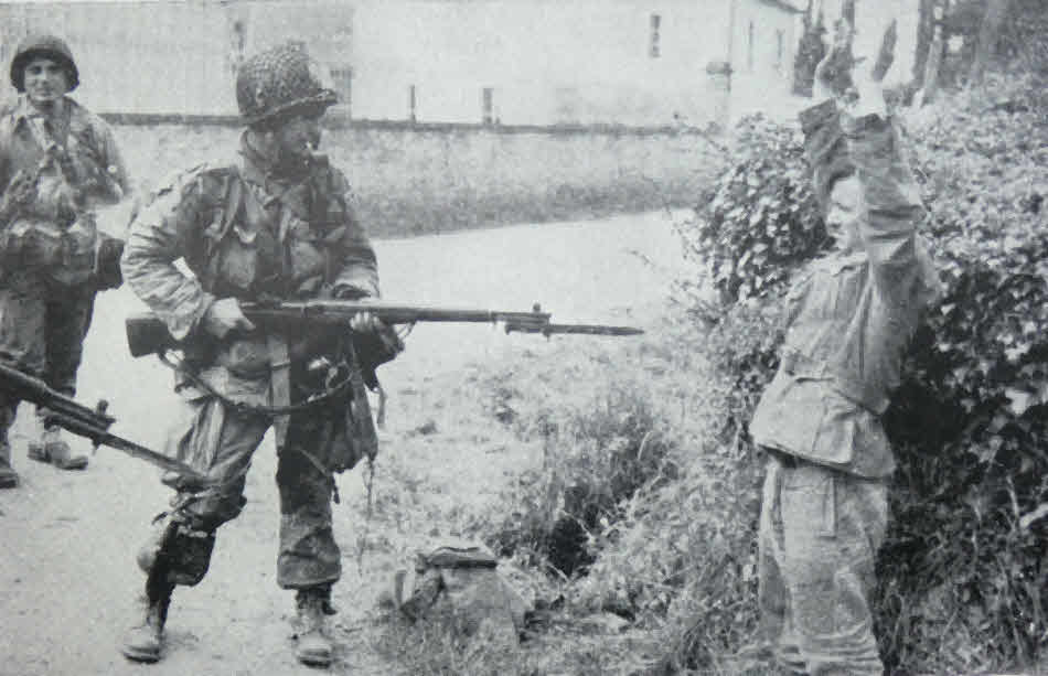 German POW taken by German Paratrooper, Normandy 