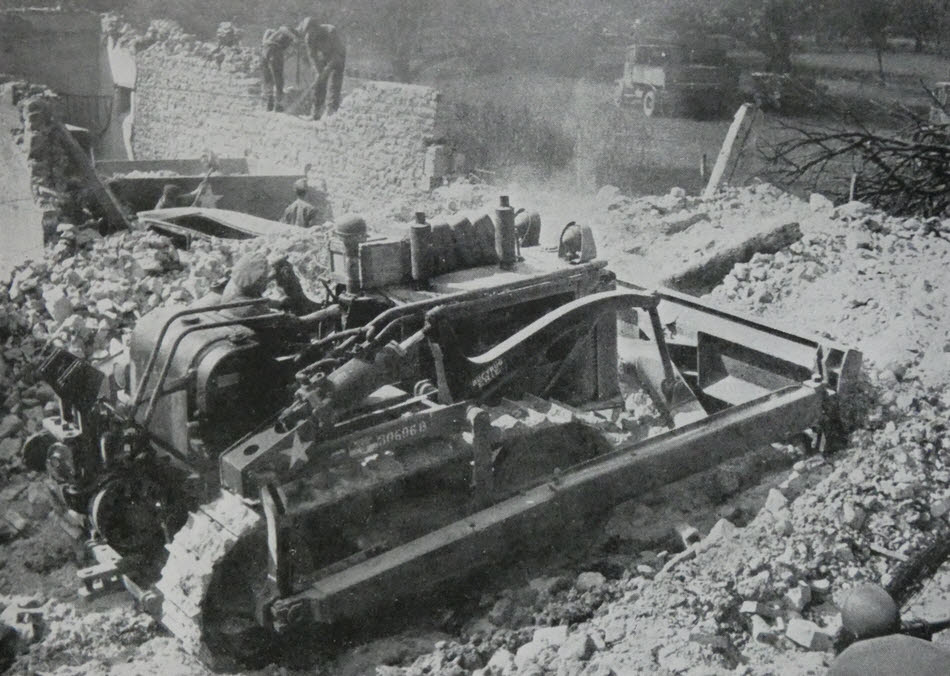 Pioneer Corps Bulldozer clearing ruins 