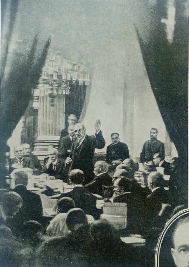 President Wilson reads Covenant of League of Nations, Paris 1919 