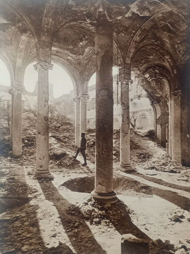 British Soldier in ruins of Arras Cathedral Cloisters 