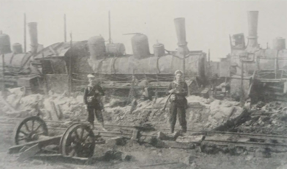 British Sailors guarding damaged locomotives, Russia, c.1918-19 