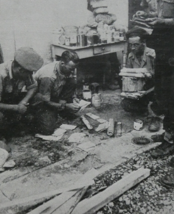 Regimental Sergeant-Major sorting mail, Florence, 1944 