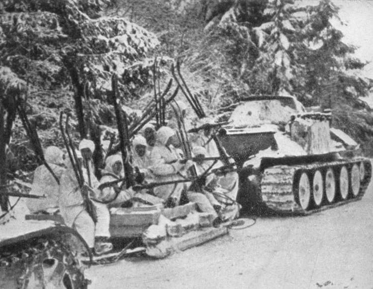 T-34 Medium Tank towing troops, Winter 1941-42