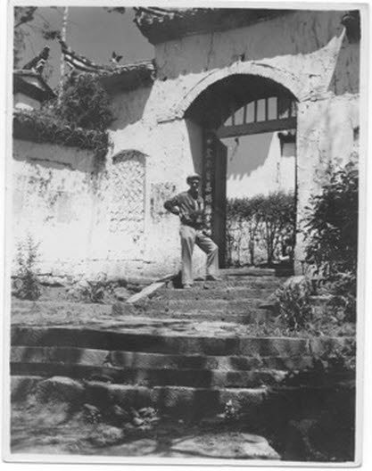 Captain Harold C. James, USAAF, at the temple gates, Kunming (2 of 2) 