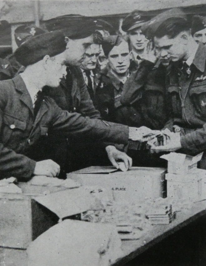 Glider Tug pilots taking emergency rations before Operation Varsity