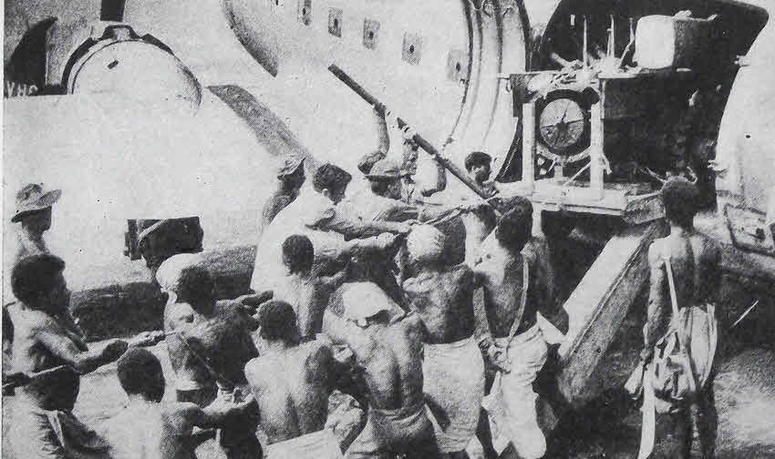 Unloading Douglas C-47 Dakota at Nadzab 